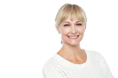 Woman with tooth implants smiling in Lincoln, NE