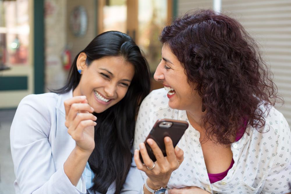 two women laughing in Lincoln NE