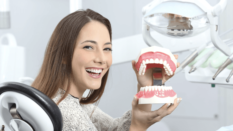 woman smiling in dental chair