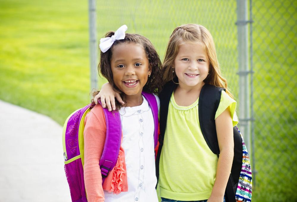 two young girls smiling
