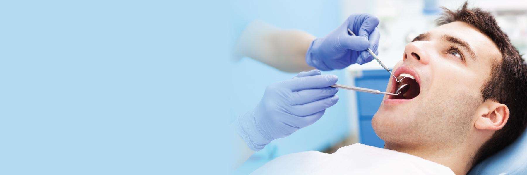 Lincoln man getting a dental exam at Antelope Creek Family Dentistry