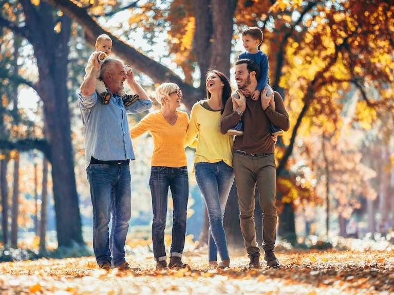 multigenerational family walking outside during the fall in lincoln