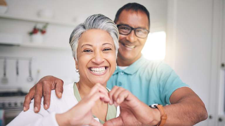 older couple with dental implants in lincoln ne
