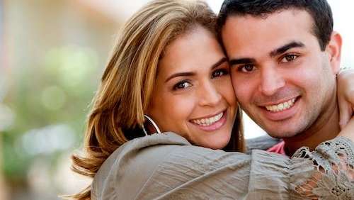 Couple smiling at Henry Park in Lincoln, NE